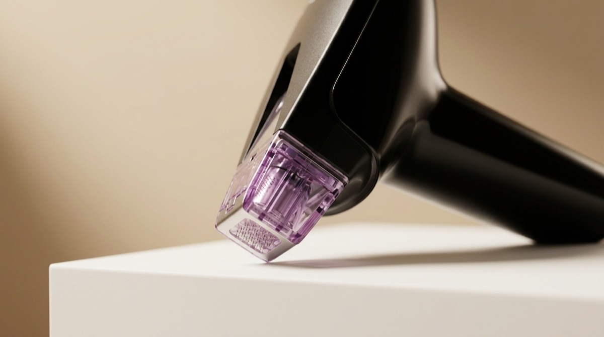 InMode Morpheus8 RF microneedling handpiece showing the fine pin cartridge that delivers radiofrequency energy below the skin