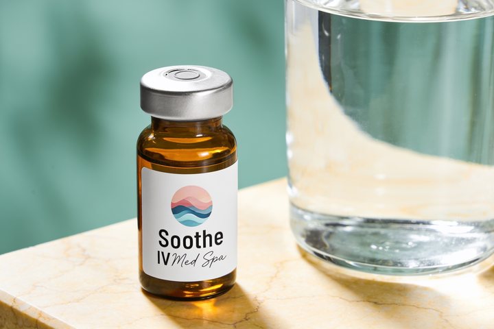 Soothe IV Med Spa branded amber pharmacy vial on warm marble, representing the performance & vitality category of physician-supervised peptide therapy