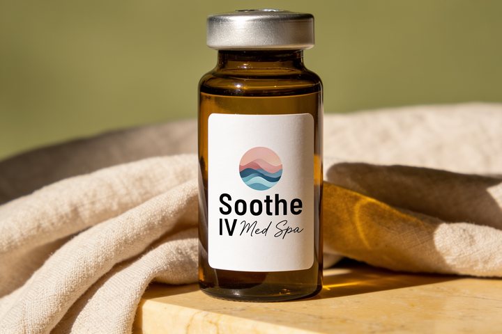 Soothe IV Med Spa branded amber pharmacy vial on warm marble, representing the metabolic optimization category of physician-supervised peptide therapy